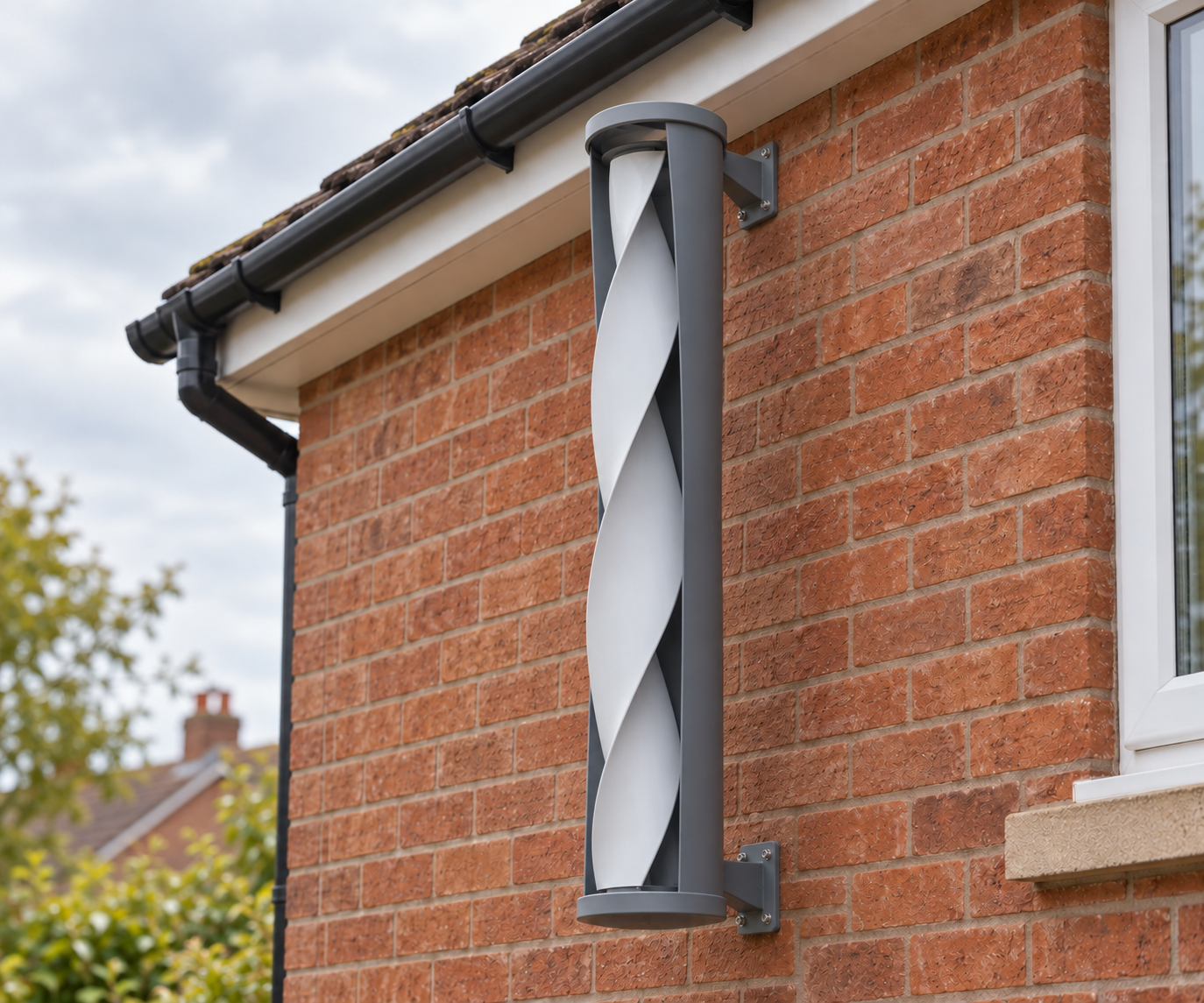 Grenie concept for a compact wall-mounted vertical-axis micro-wind turbine fixed to a brick wall below the roofline.